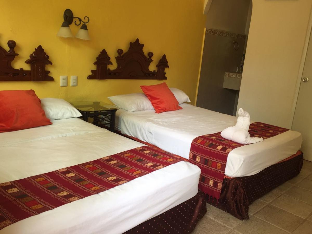 Hotel San Miguel Arcangel Исамал Екстериор снимка