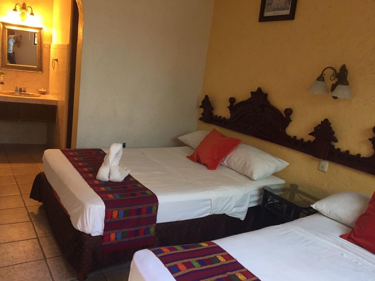 Hotel San Miguel Arcangel Исамал Екстериор снимка