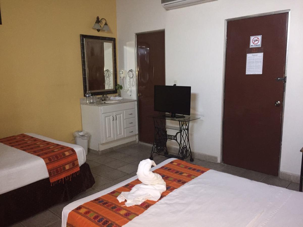 Hotel San Miguel Arcangel Исамал Екстериор снимка